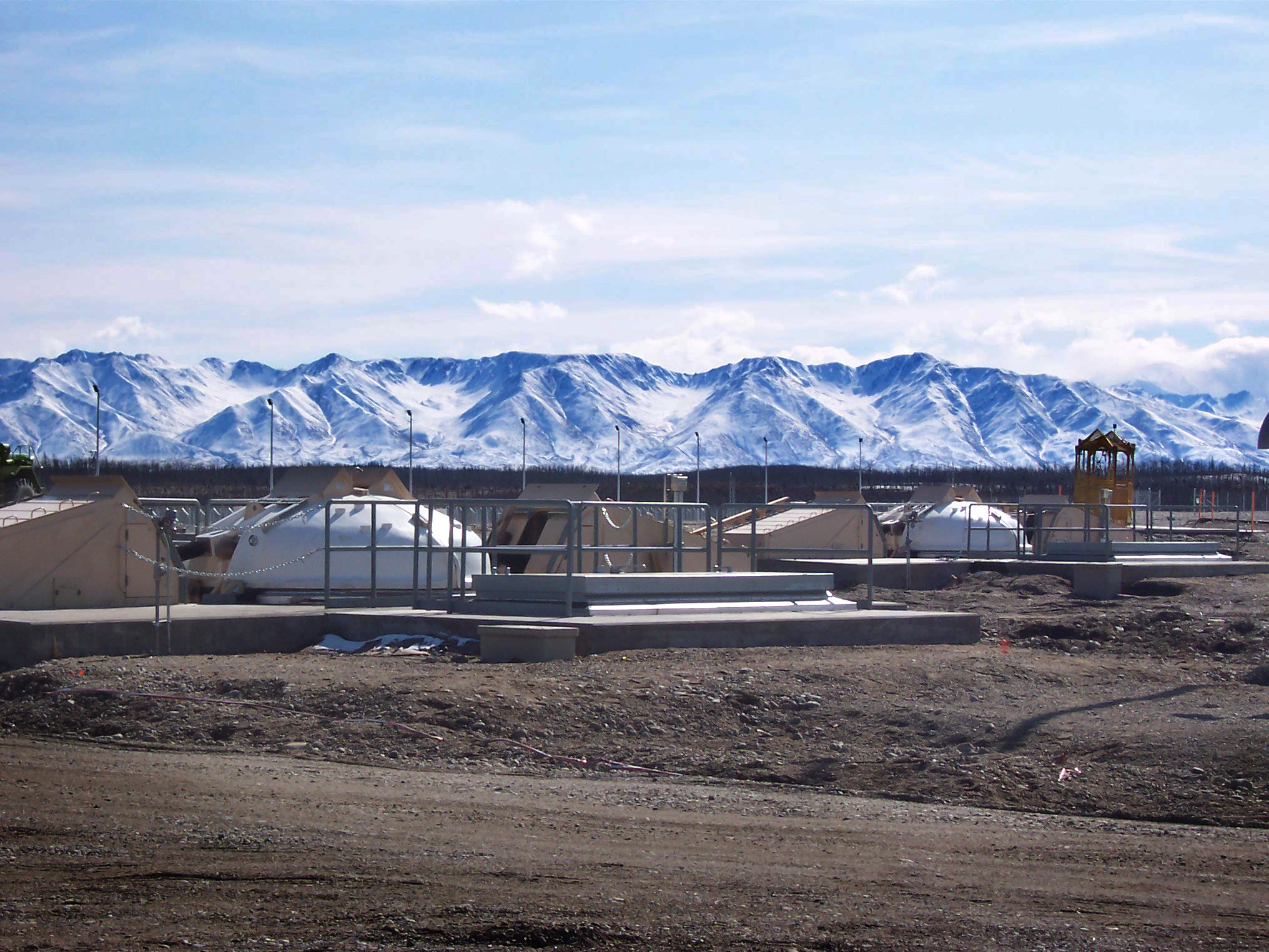 Completed missile silos shown prior to placement of final grading sub base and base material. Ft. Greely, Alaska.