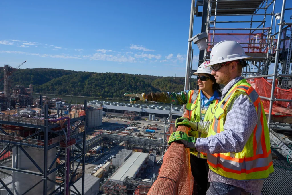 Workers look out at the Pennsylvania Chemicals site.