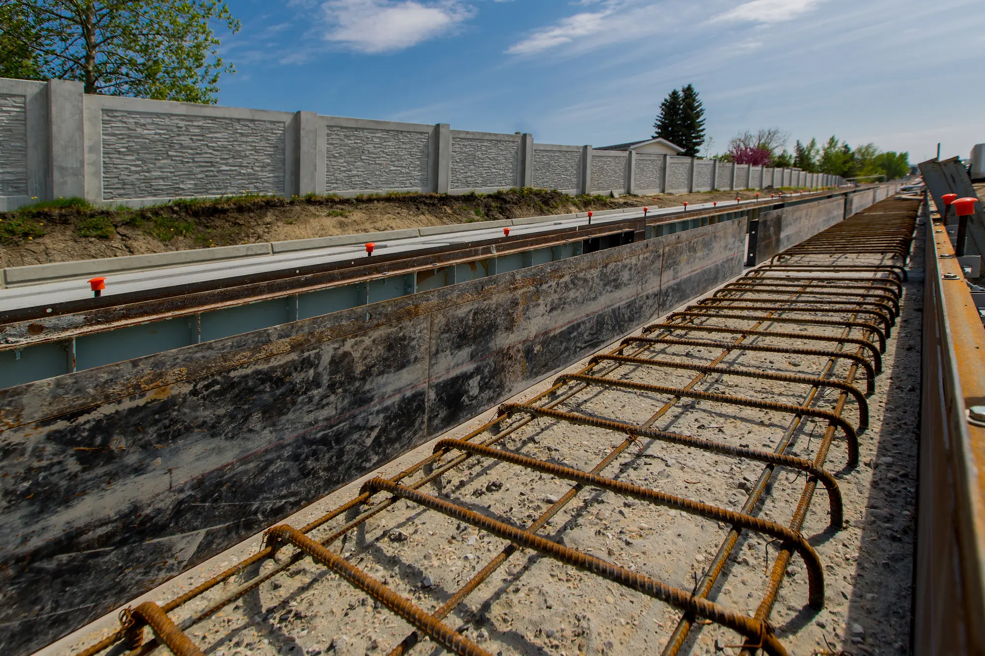 Closeup view of rail tracks on a sunny day.
